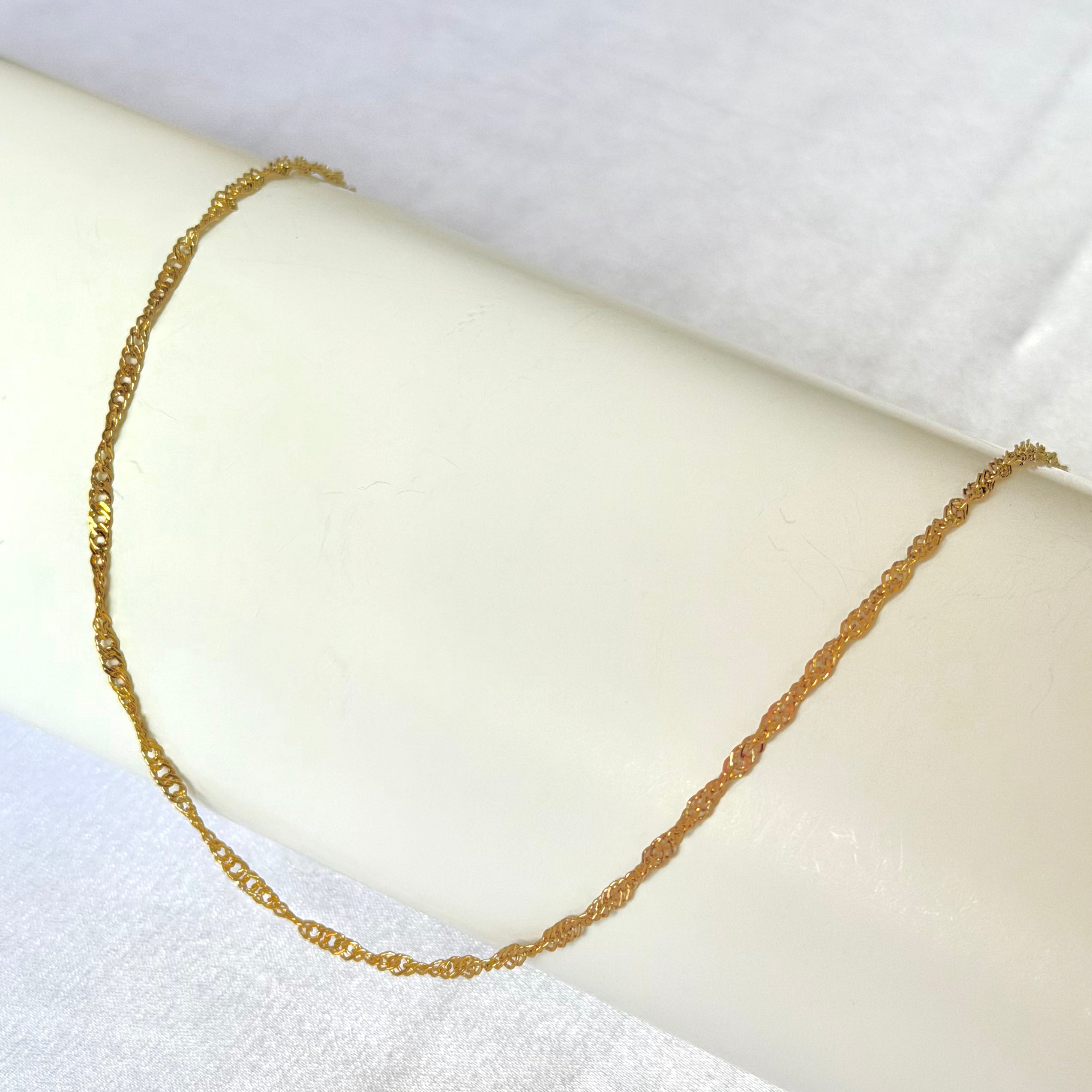 Cadena Singapur Mujer